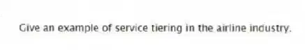 Give an example of service tiering in the airline industry.