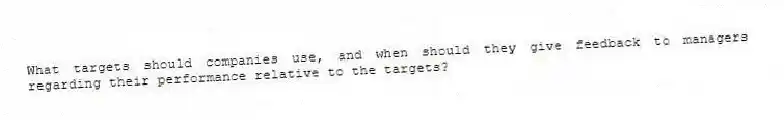 What targets should companies use, and when should they give feedback to managers regarding their performance relative to the targets?