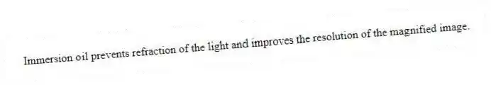 Immersion oil prevents refraction of the light and improves the resolution of the magnified image.